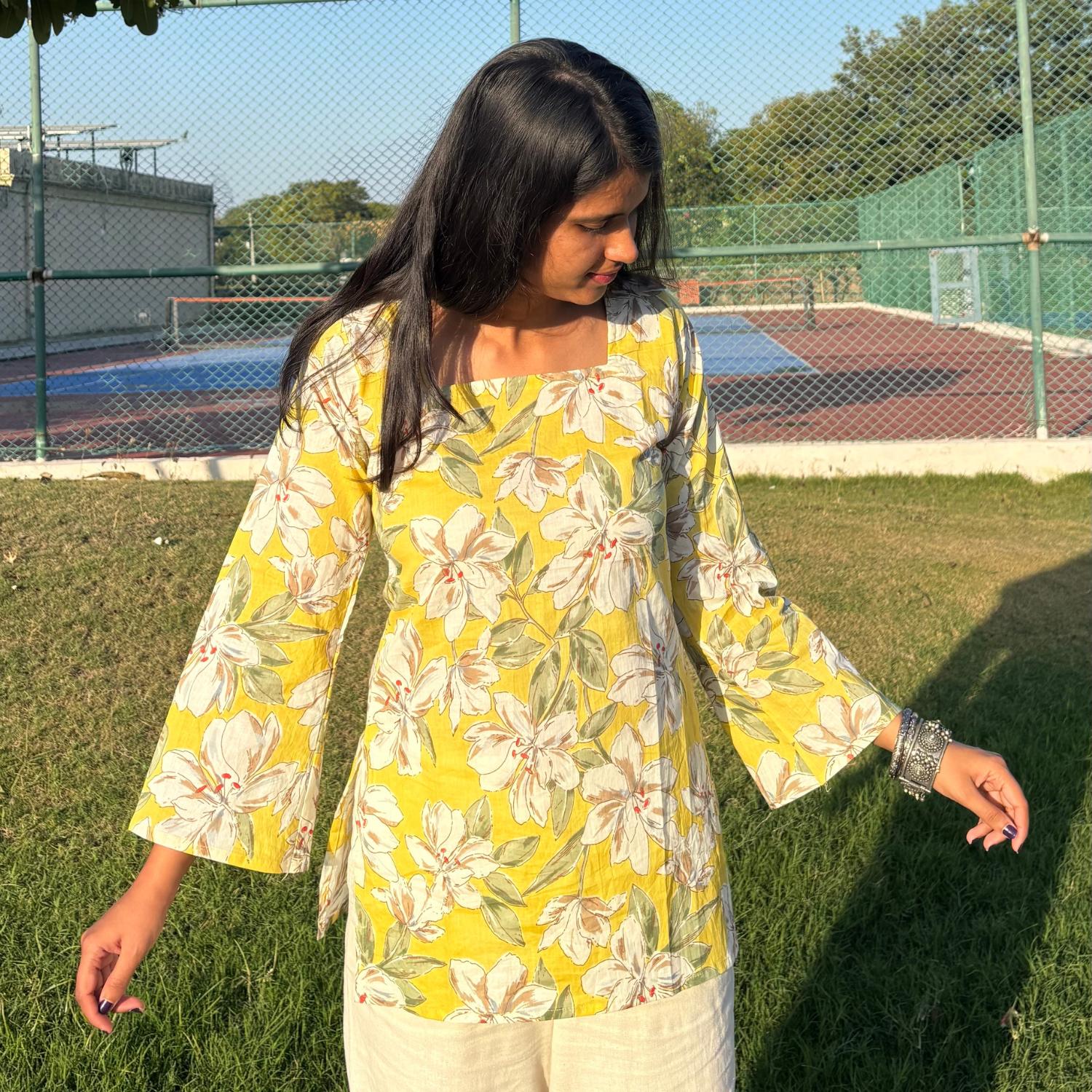 Pure Cotton Full Sleeves Yellow Floral Printed Short Kurti With Back Zig Zag Dori