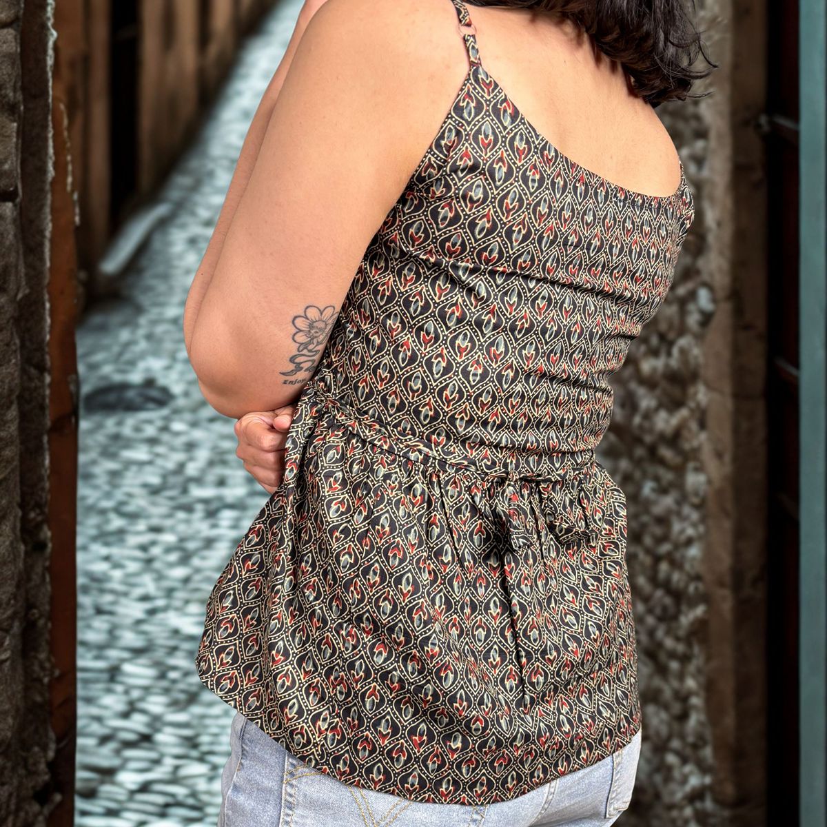 Black Cotton Printed Peplum Step Top For Women Sleeveless