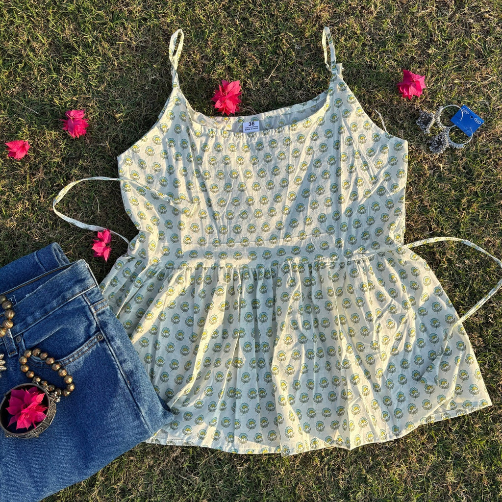 White Sleeveless Pure Cotton Printed Peplum Step Top For Women