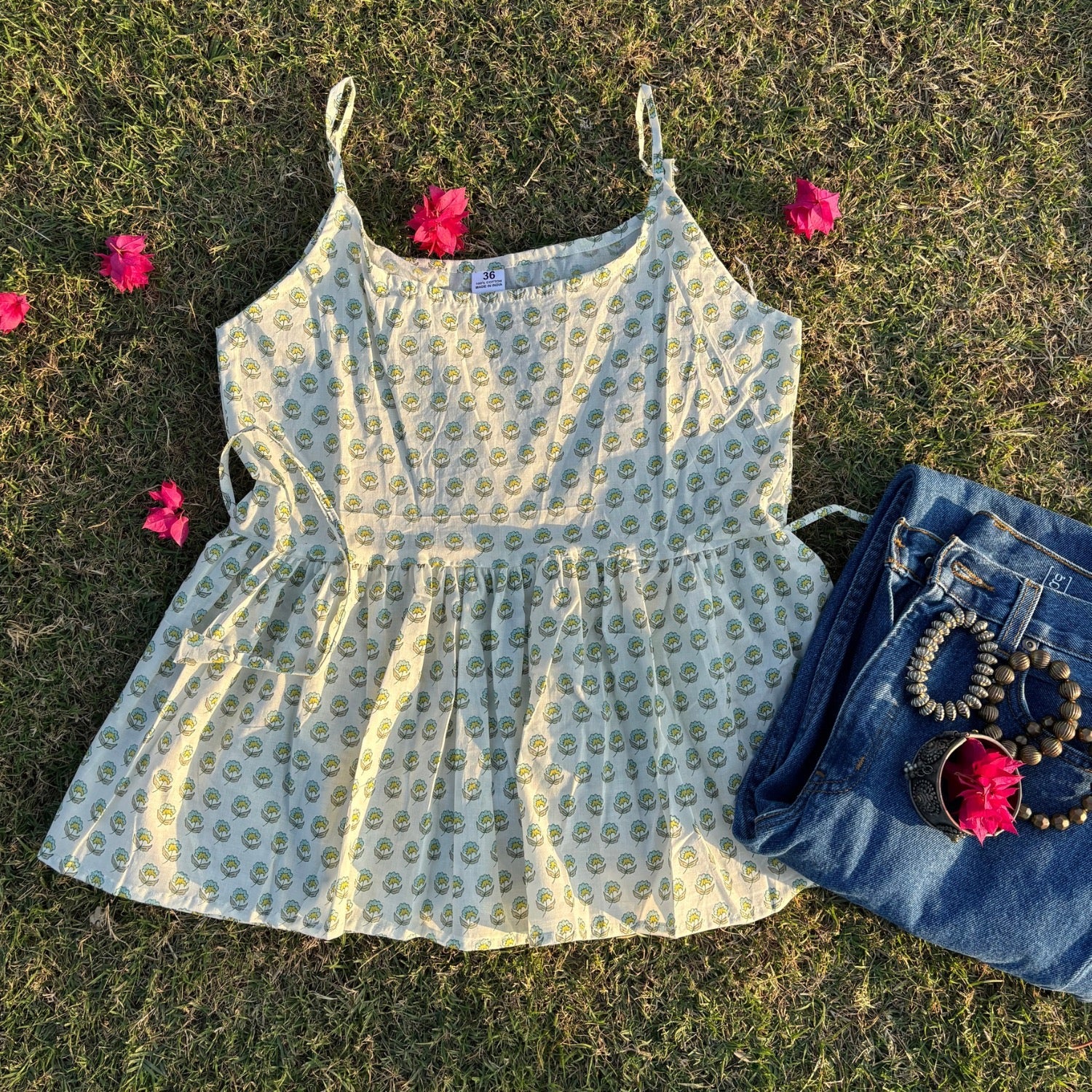 White Sleeveless Pure Cotton Printed Peplum Step Top For Women